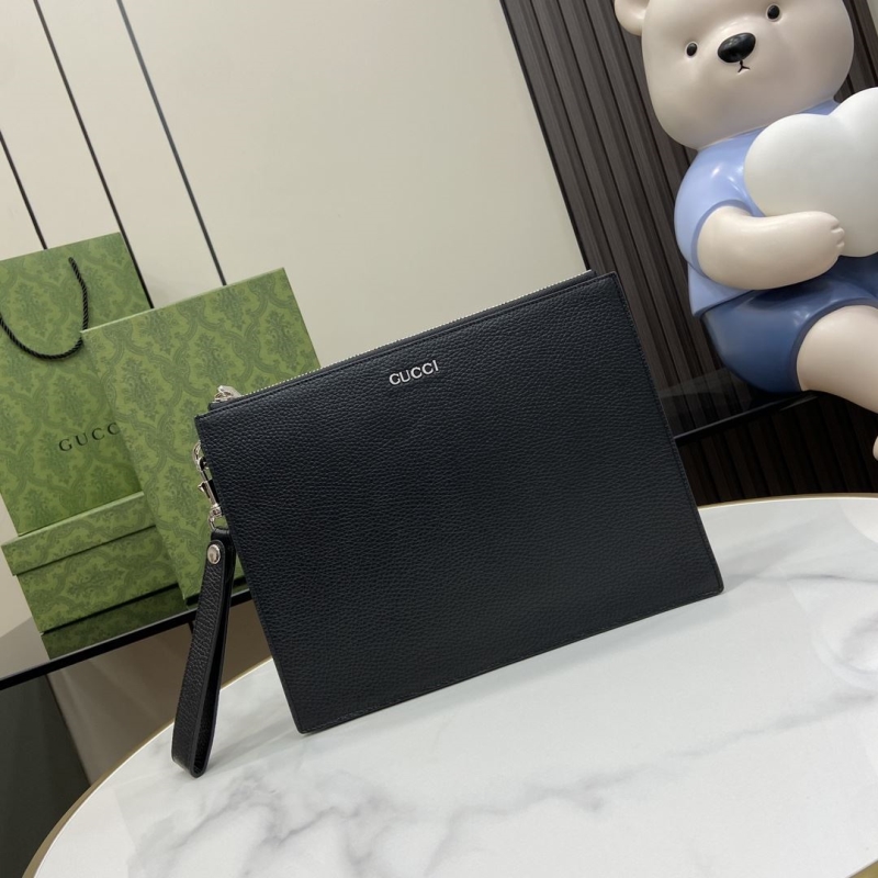 G*u*i clutch bags
